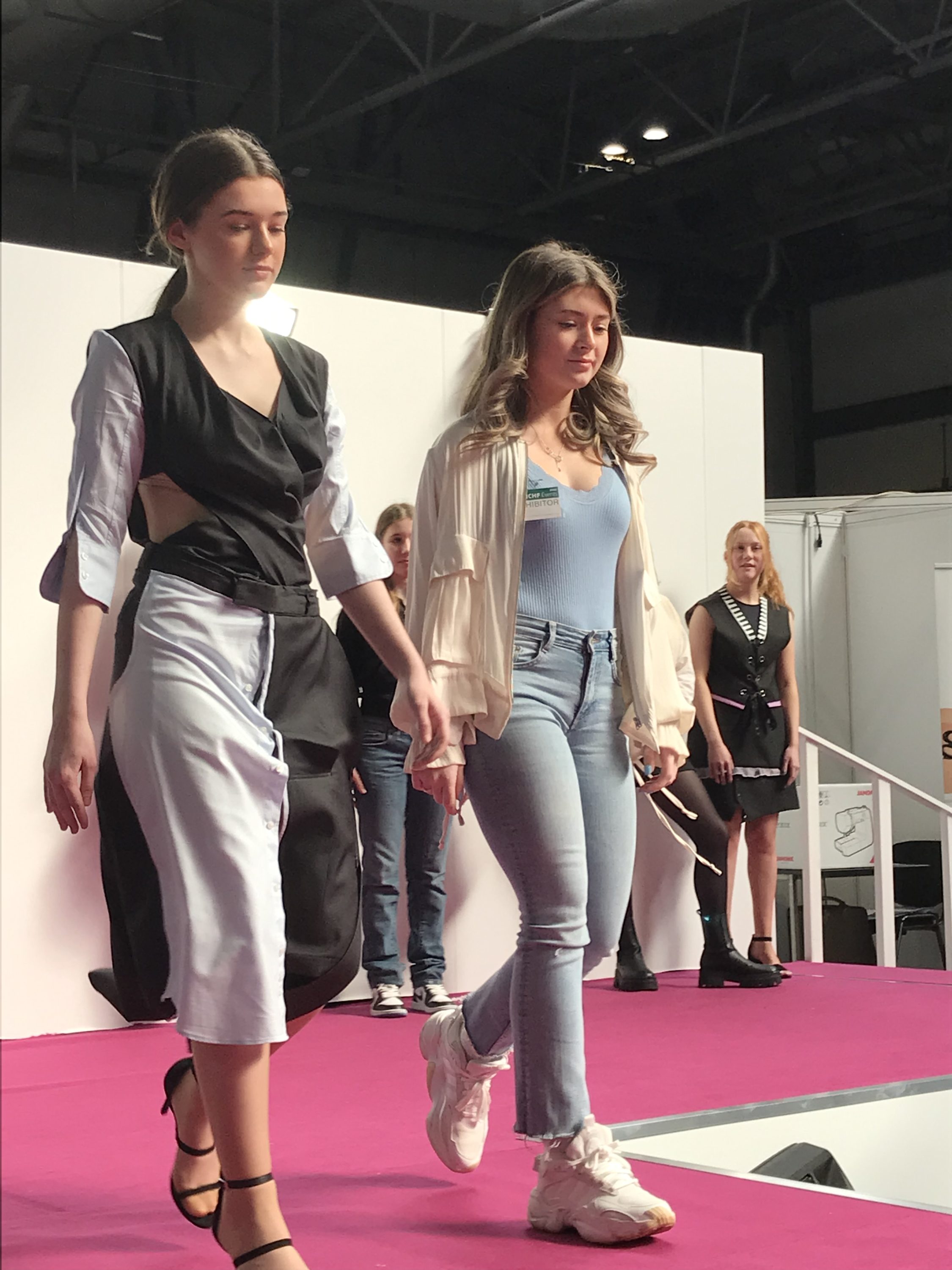 Emily accompanying her modelled garment on the catwalk at NEC Emily accompanying her modelled garment on the catwalk at NEC