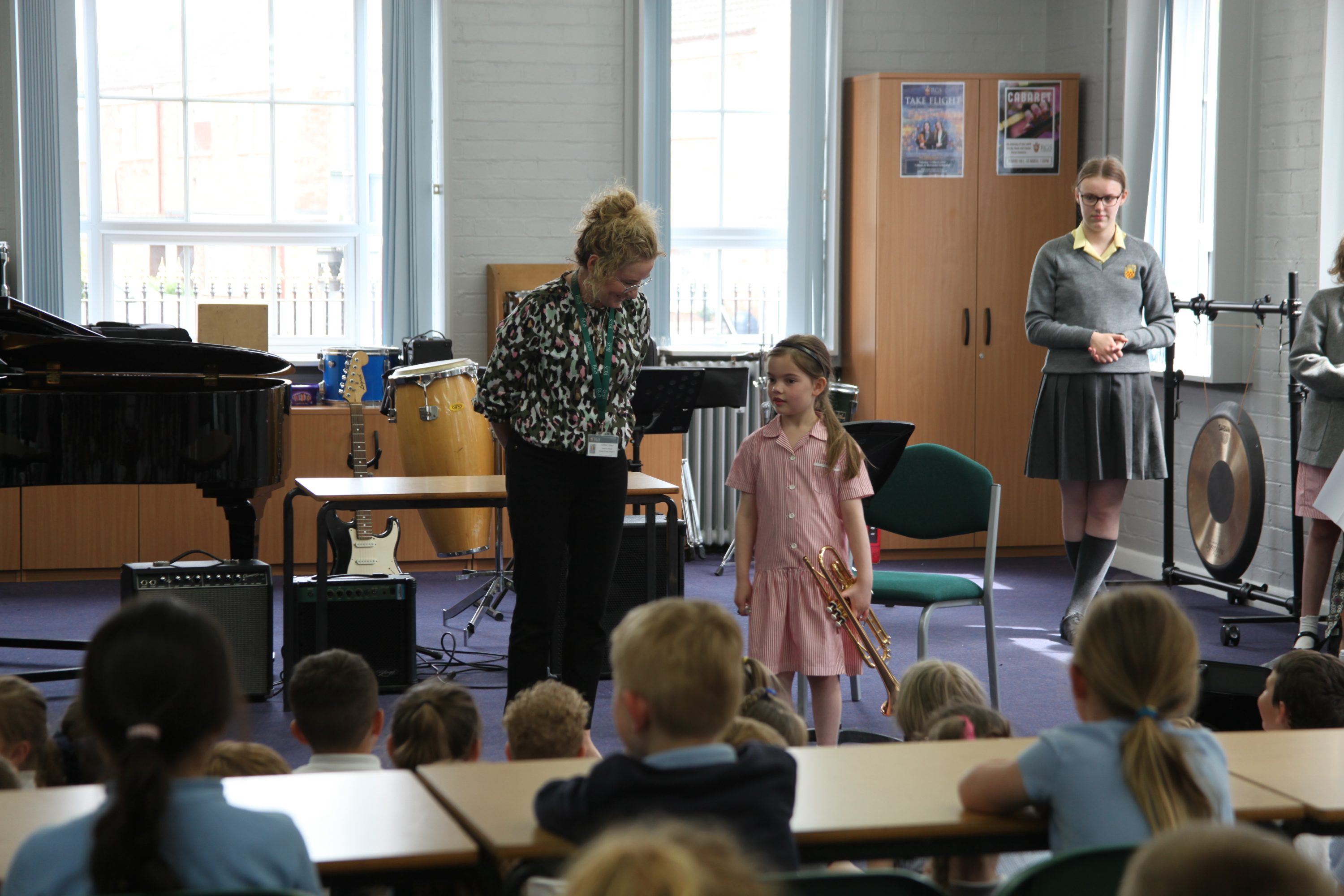 Pupils explore instruments with Mrs Vincent