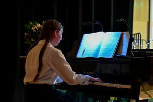 RGS Dodderhill pupil on piano