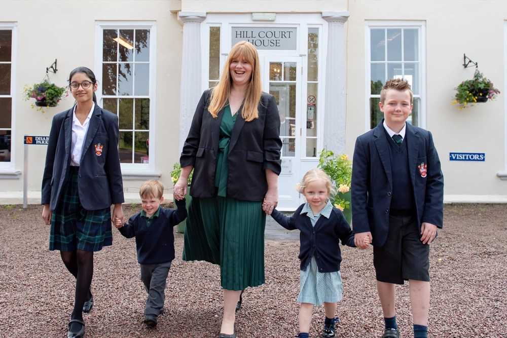 Headteacher with pupils