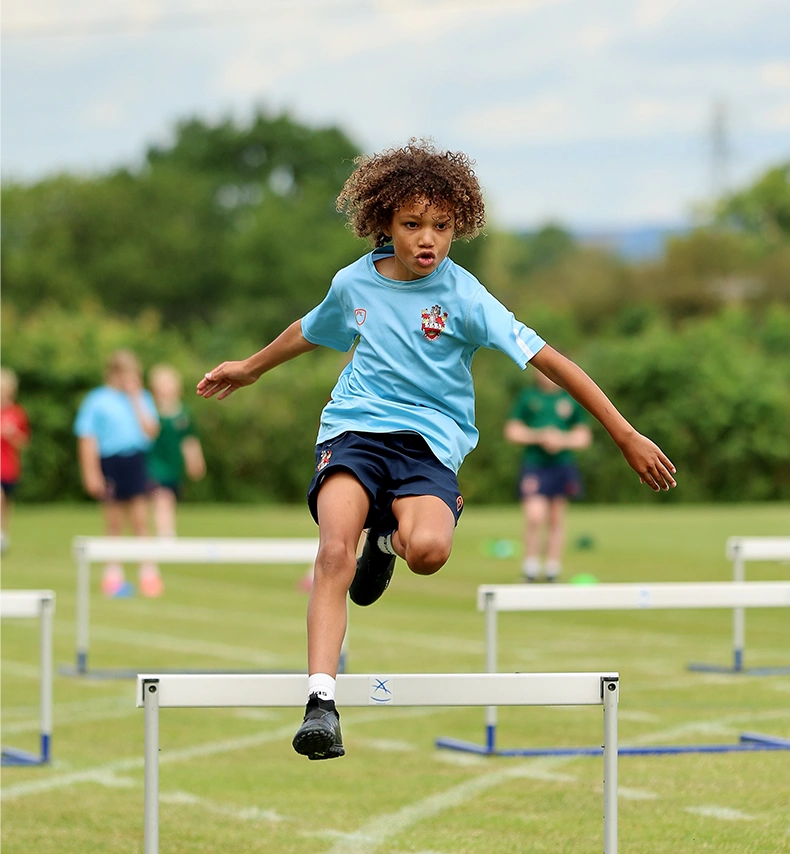 RGS The Grange pupil doing hurdles