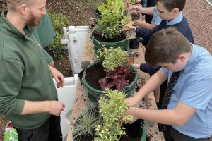 Lower School Gardening Club Blooms into Action Lower School Gardening Club Blooms into Action
